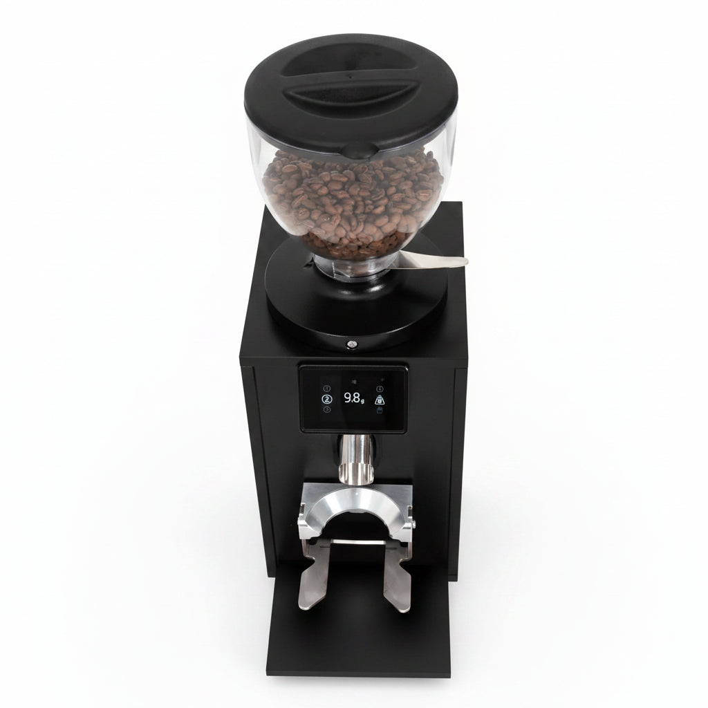A black electric coffee grinder filled with roasted coffee beans, featuring a clear bean hopper, a digital control panel, and a metal chute on a white background.