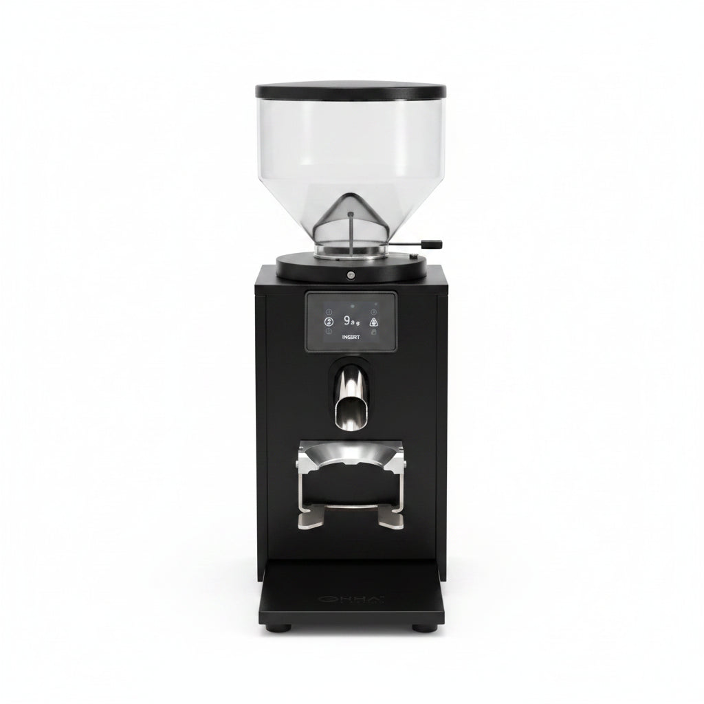 Close-up of a black countertop coffee grinder with a digital display screen showing '9.3 g' and 'INSERT', plus a stainless steel portafilter holder and bean hopper.