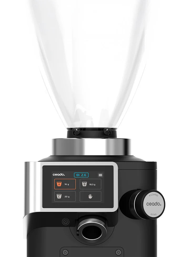Black coffee grinder with digital display and control knobs on a white background