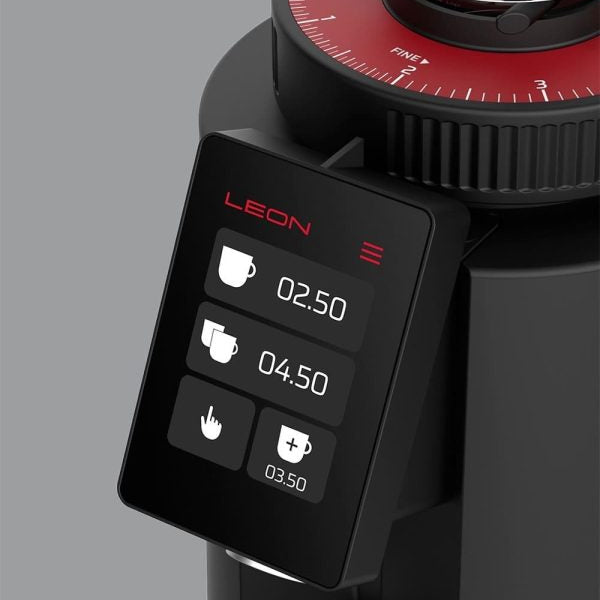 Close-up of a black coffee grinder with a digital touch display screen showing settings and a red dial on top, branded LEON.