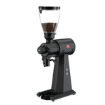 Black coffee grinder with a clear container of ground coffee on a white background