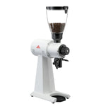 White coffee grinder with black accents on a white background