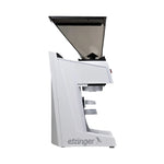 White coffee grinder with black top on a white background, featuring the etzinger brand.