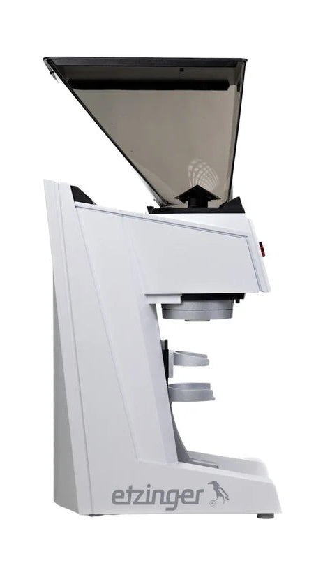 White coffee grinder with black top on a white background, featuring the etzinger brand.
