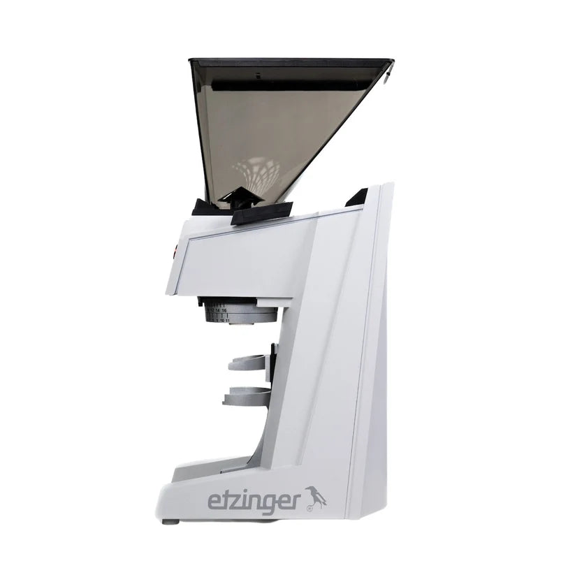 White coffee grinder with black top on a white background, featuring the etzinger brand.