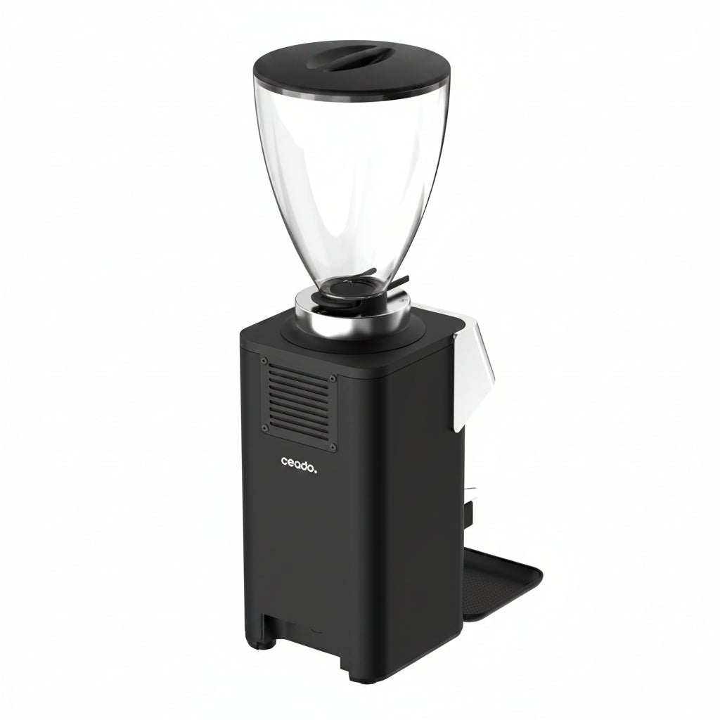 Black coffee grinder with clear container on a white background