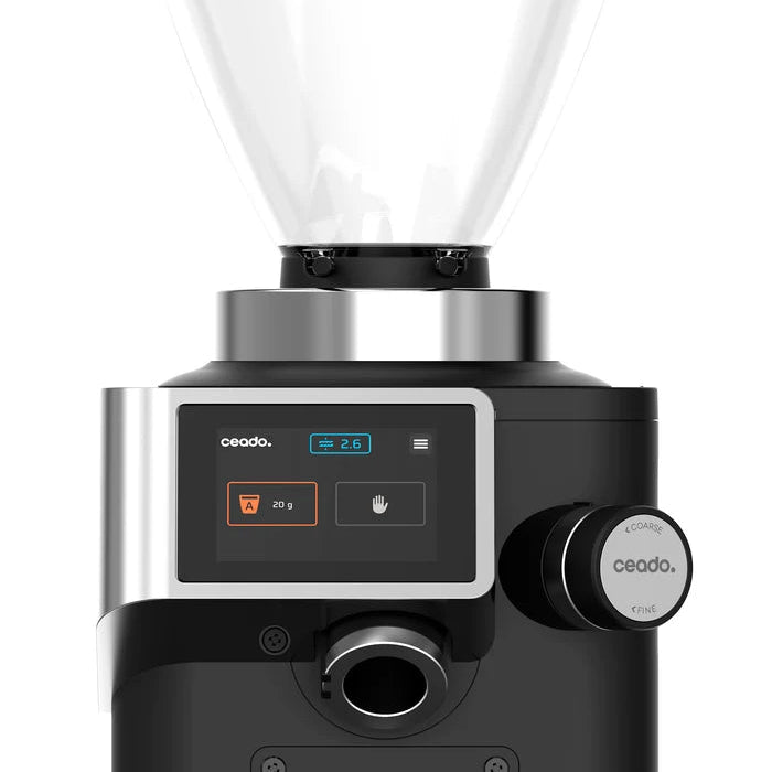 Black coffee grinder with digital display and control knobs on a white background